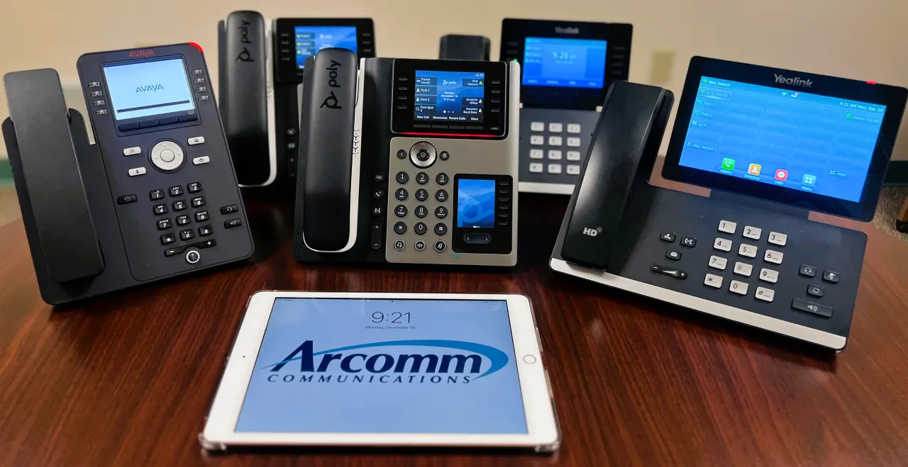 Arcomm Connect VoIP business phone on a desk in a New Hampshire office